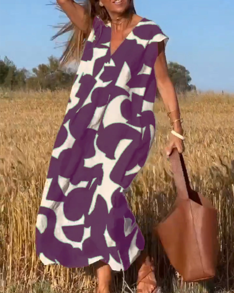 Vestido estampado con escote en V y corte fluido – STEPHARA