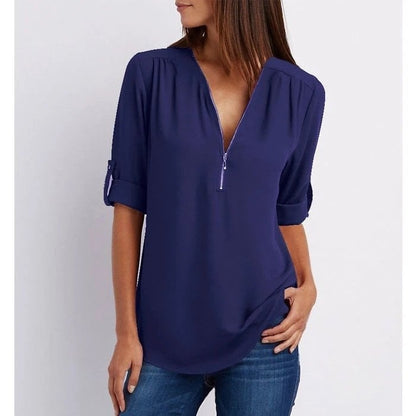 Top relajado con diseño moderno y media cremallera para mujer – LYSANDRA
