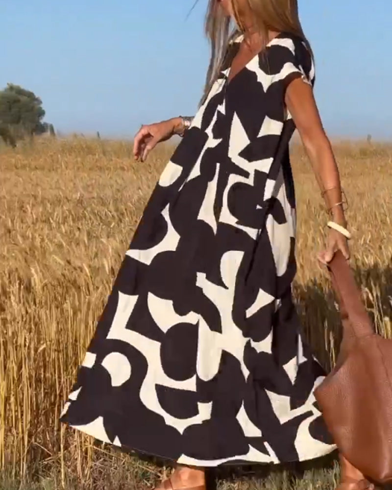 Vestido estampado con escote en V y corte fluido – LYSÉA