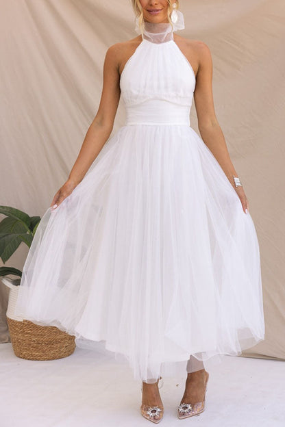Vestido midi con escote halter y falda voluminosa – Lirenza