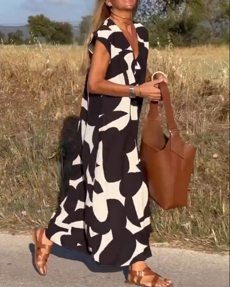 Vestido estampado con escote en V y corte fluido – STEPHARA