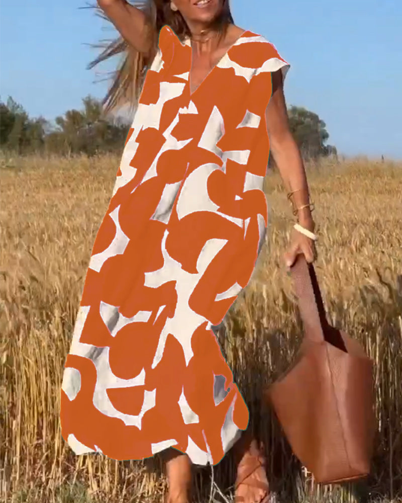 Vestido estampado con escote en V y corte fluido – STEPHARA