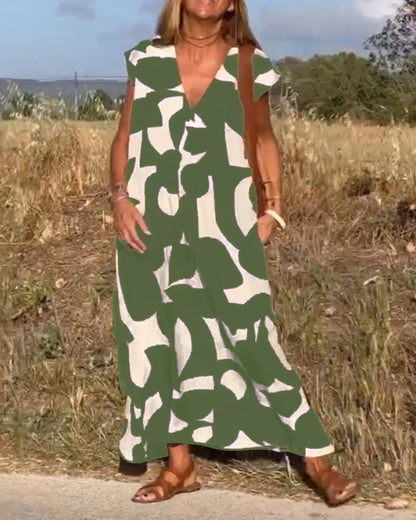 Vestido estampado con escote en V y corte fluido – STEPHARA