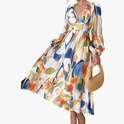 Vestido midi floral con vuelo romántico y escote cruzado – AMARELLA