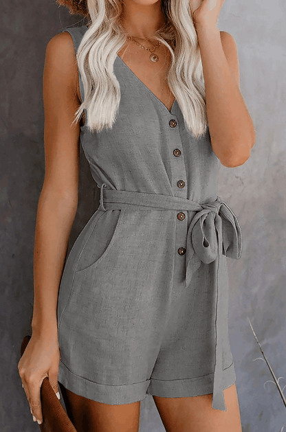 Mono de lino elegante con detalle de lazada en la cintura – LUMARIA