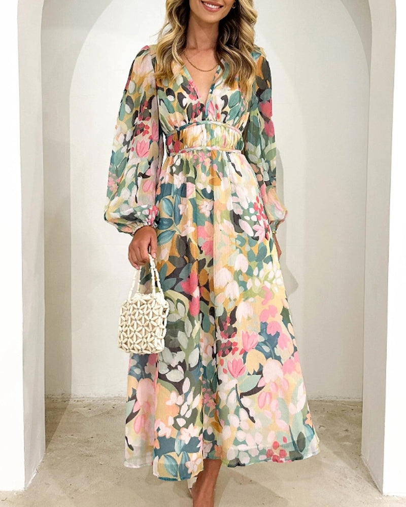 Vestido midi floral con vuelo romántico y escote cruzado – AMARELLA