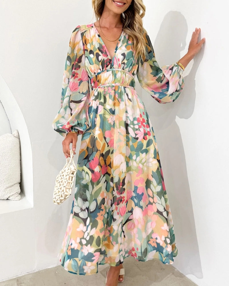 Vestido midi floral con vuelo romántico y escote cruzado – AMARELLA