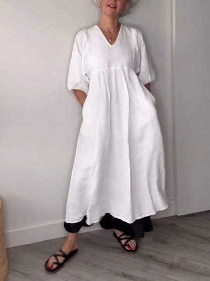 Vestido midi con escote en V, bolsillos y corte fluido – LUCIE